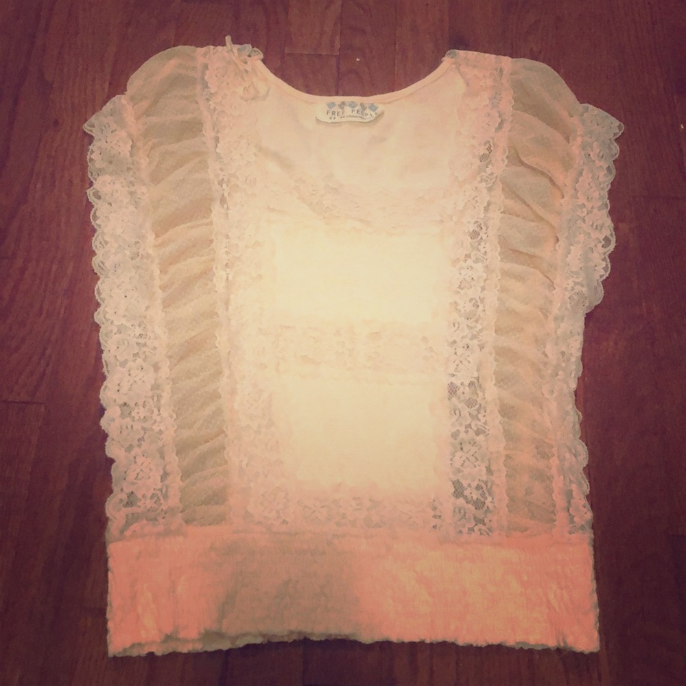 Free people top it’s a light peach color